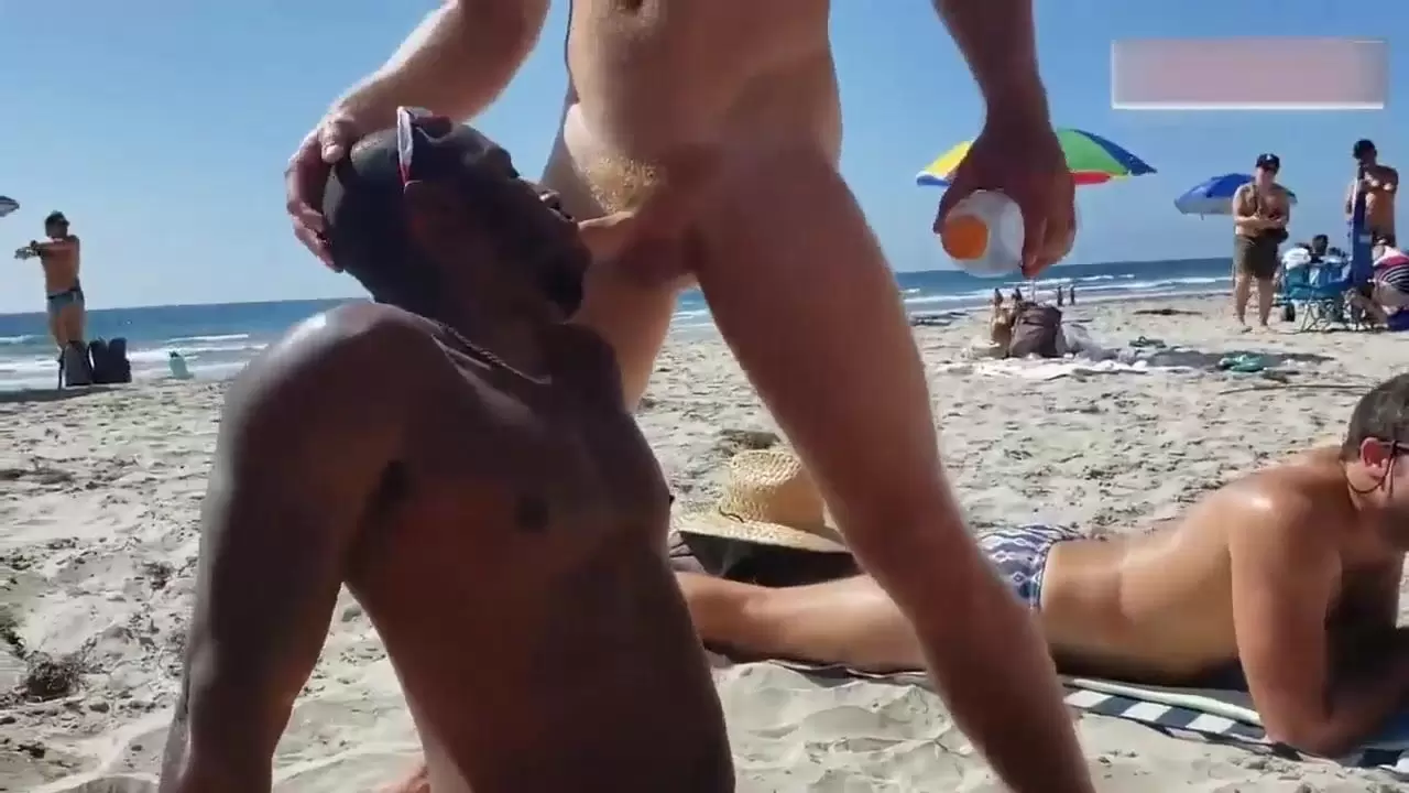 1280px x 720px - Black and white gay on a public beach. Interracial outdoor at Gay0Day