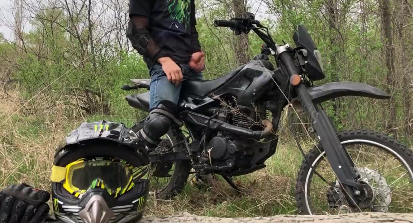 Handsome BIKER while riding a MOTORCYCLE in the forest JERKS OFF and CUMS  in public