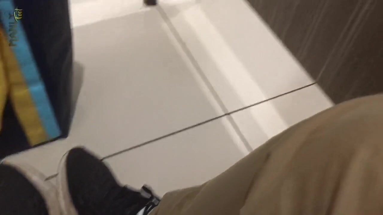Public restroom bare feet